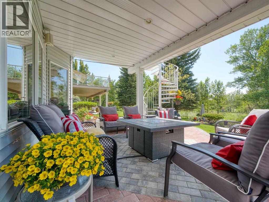 Lower Patio Offers Shelter from Elements with Sun Screens and Wind Curtains