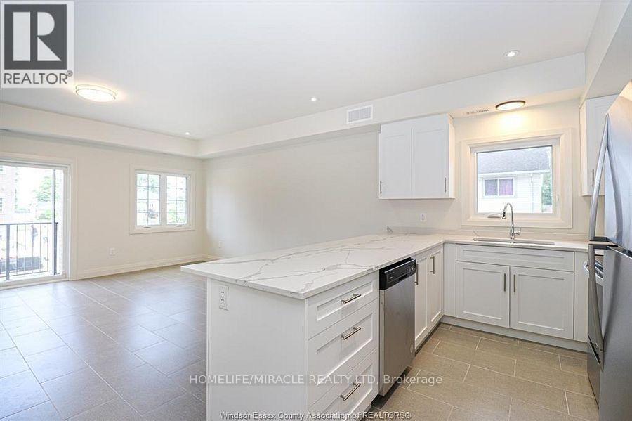 #204 233 WATSON AVENUE - 3