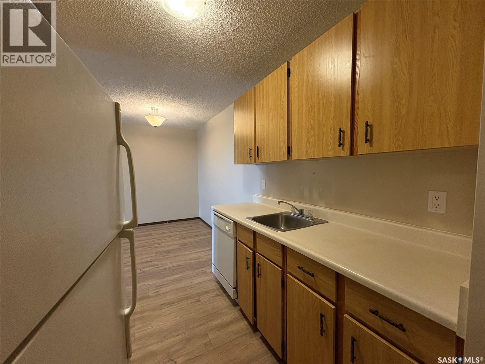 #303 1140 9th AVENUE NE - 2