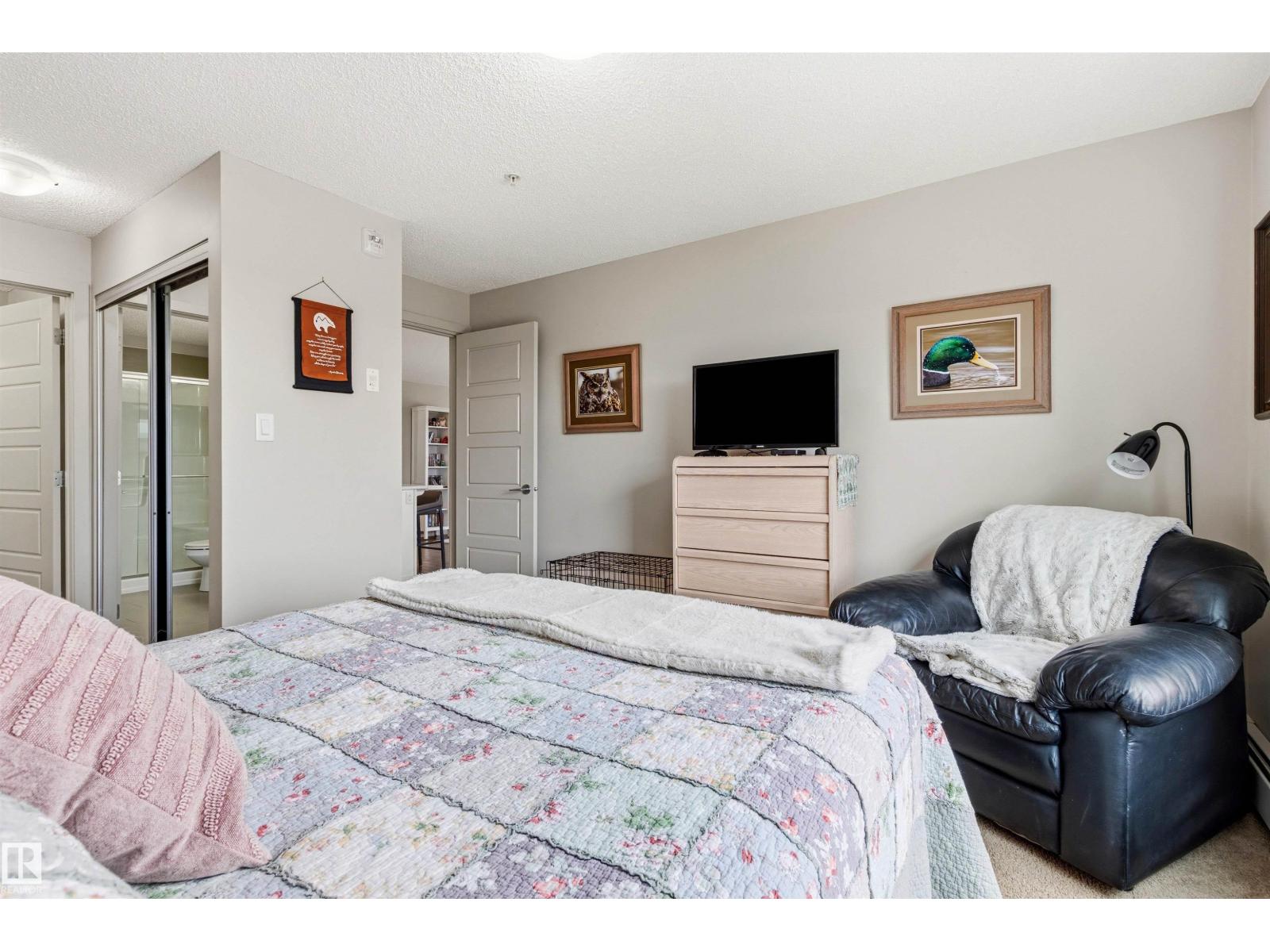 #302 5510 SCHONSEE DR NW - 33