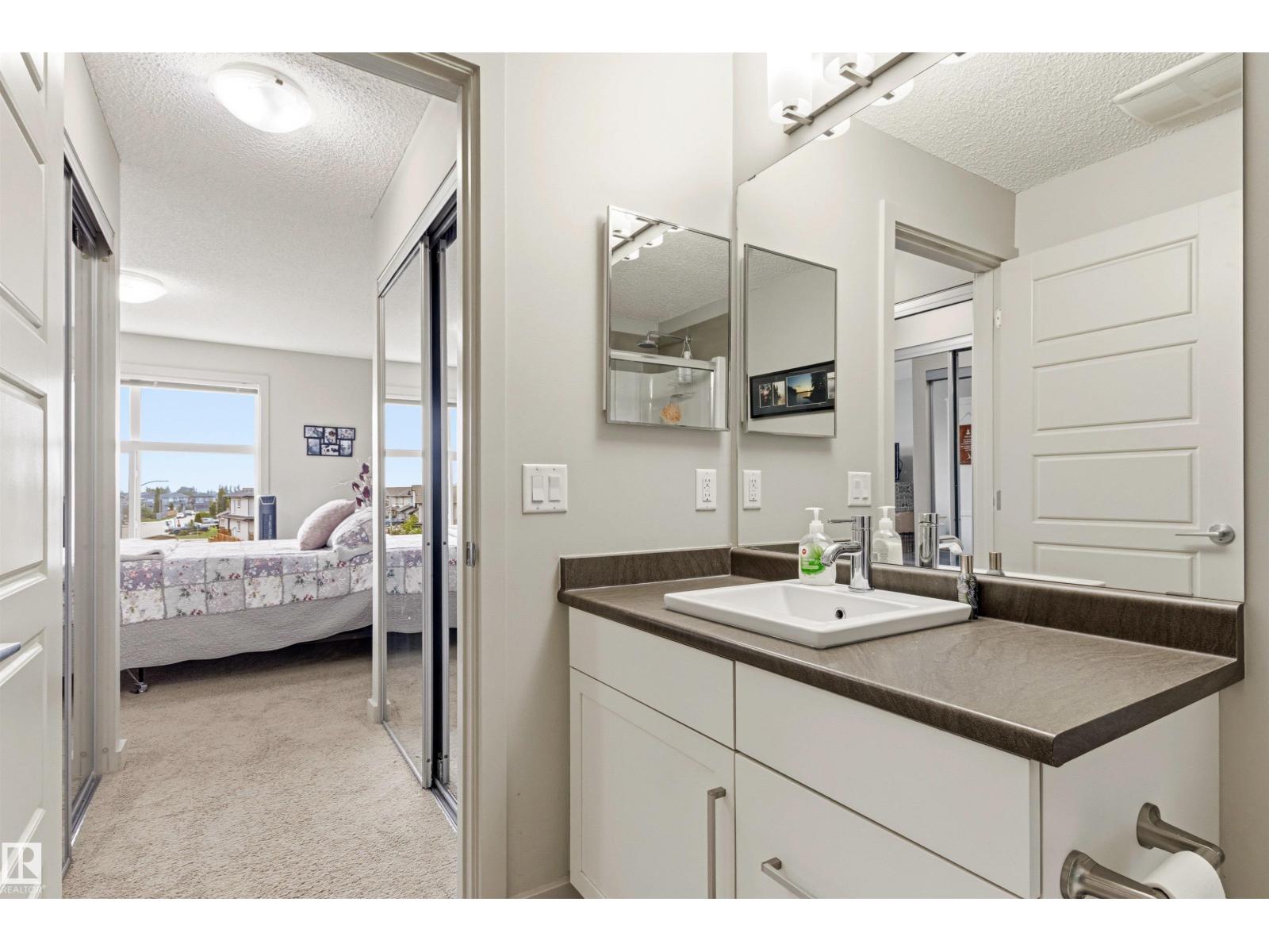 #302 5510 SCHONSEE DR NW - 37