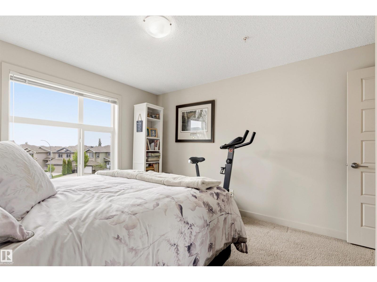 #302 5510 SCHONSEE DR NW - 40