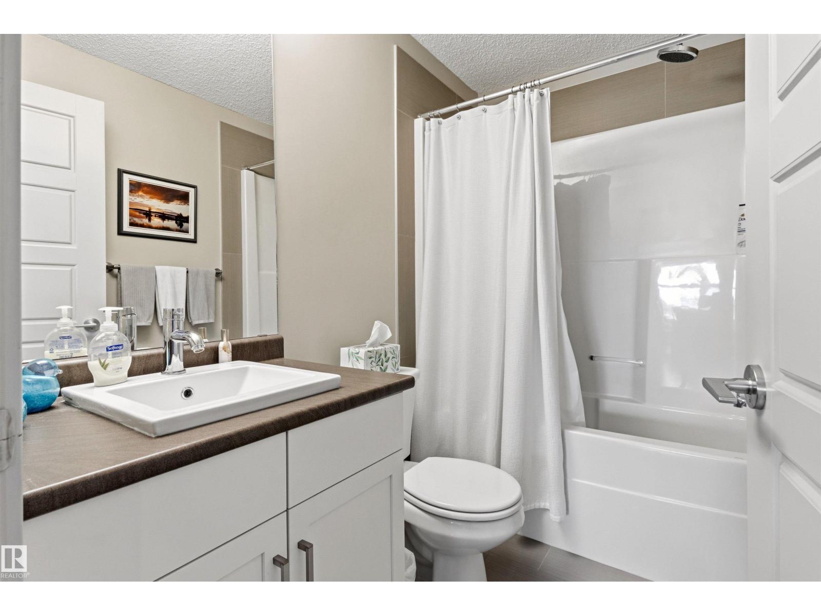 #302 5510 SCHONSEE DR NW - 42
