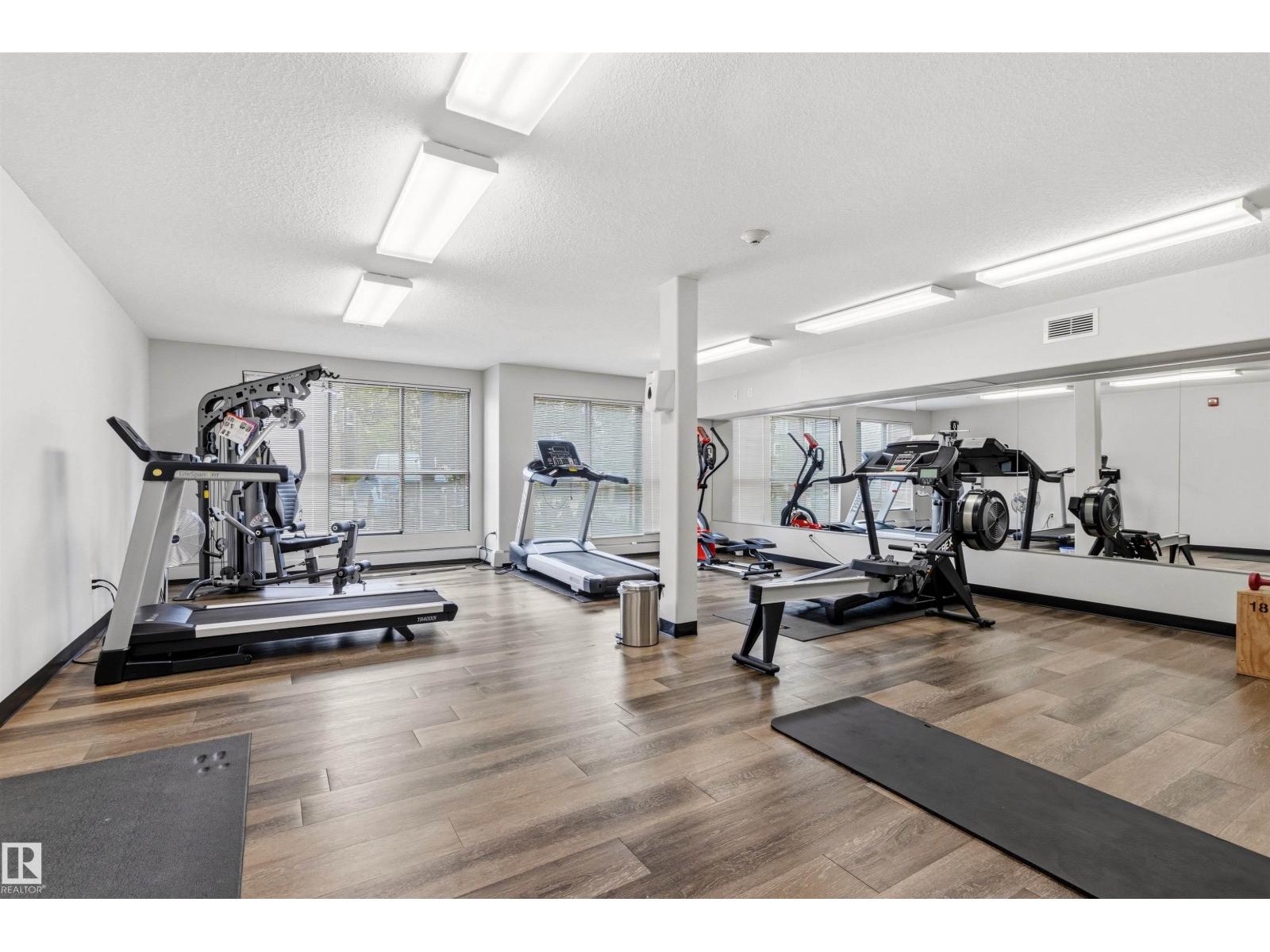 #302 5510 SCHONSEE DR NW - 55