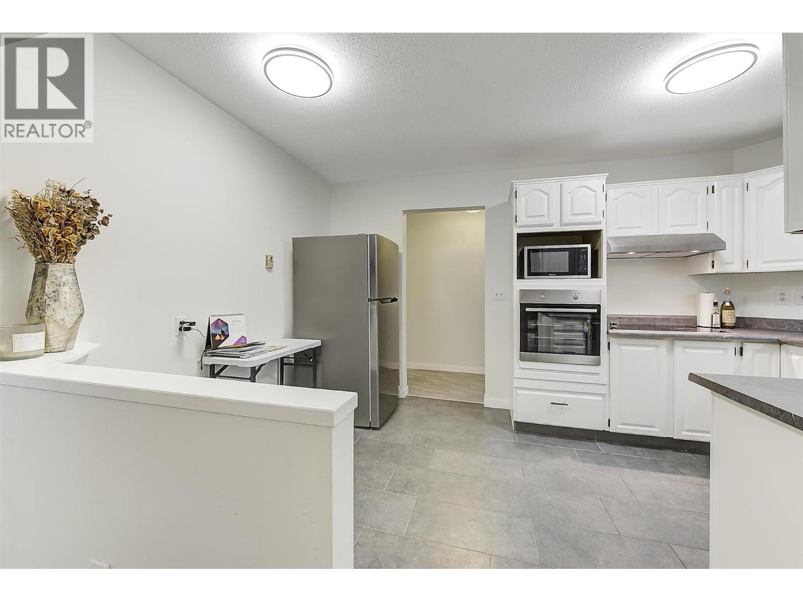 #203 1534 Lawrence Avenue - 4