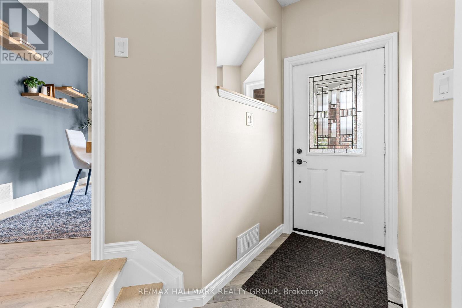 Bright foyer with closet storage
