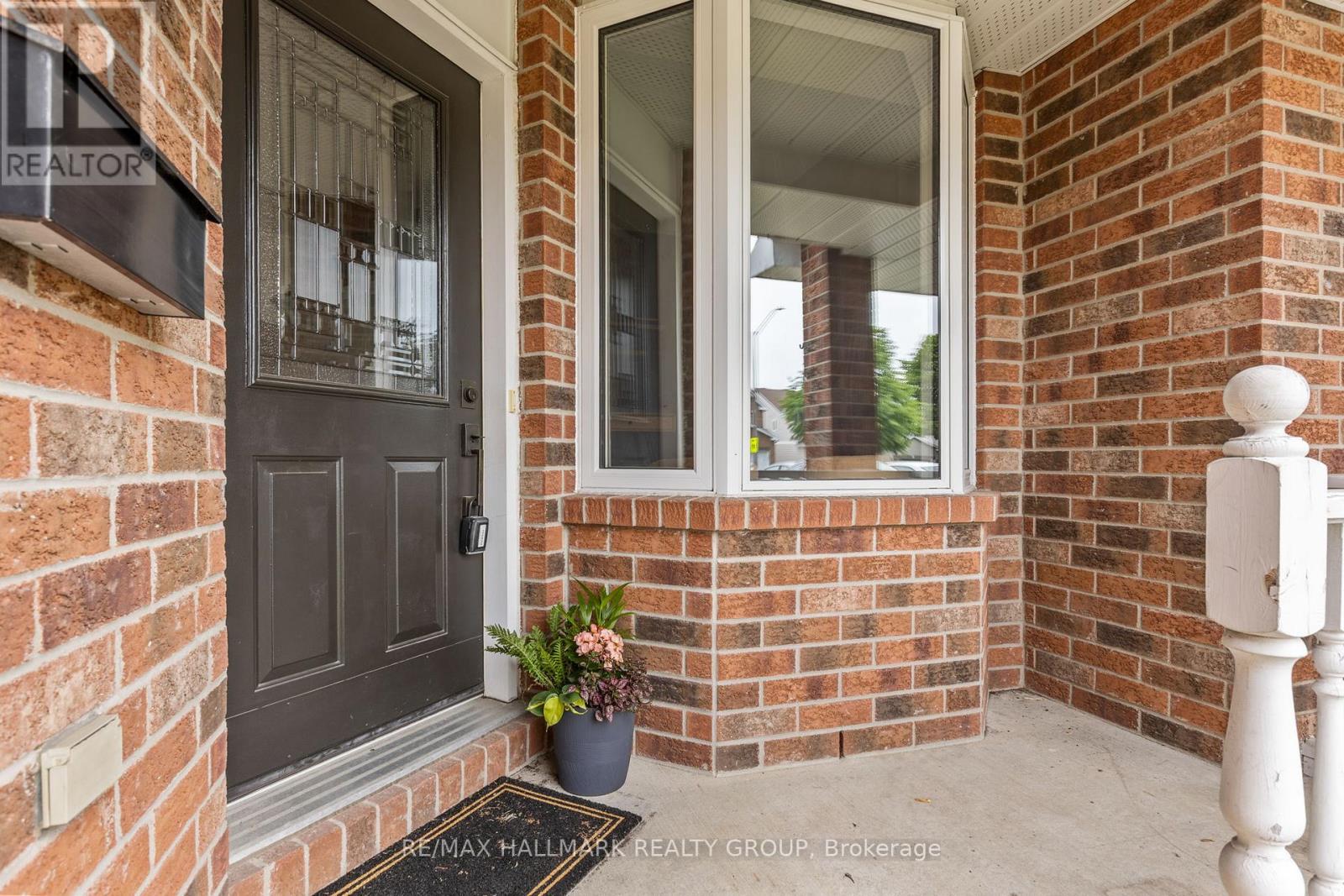 Welcoming front porch with bay window