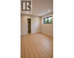 Living room - 26-32 Rue Sebastien Street, Dieppe, NB E1A0A2 Photo 12