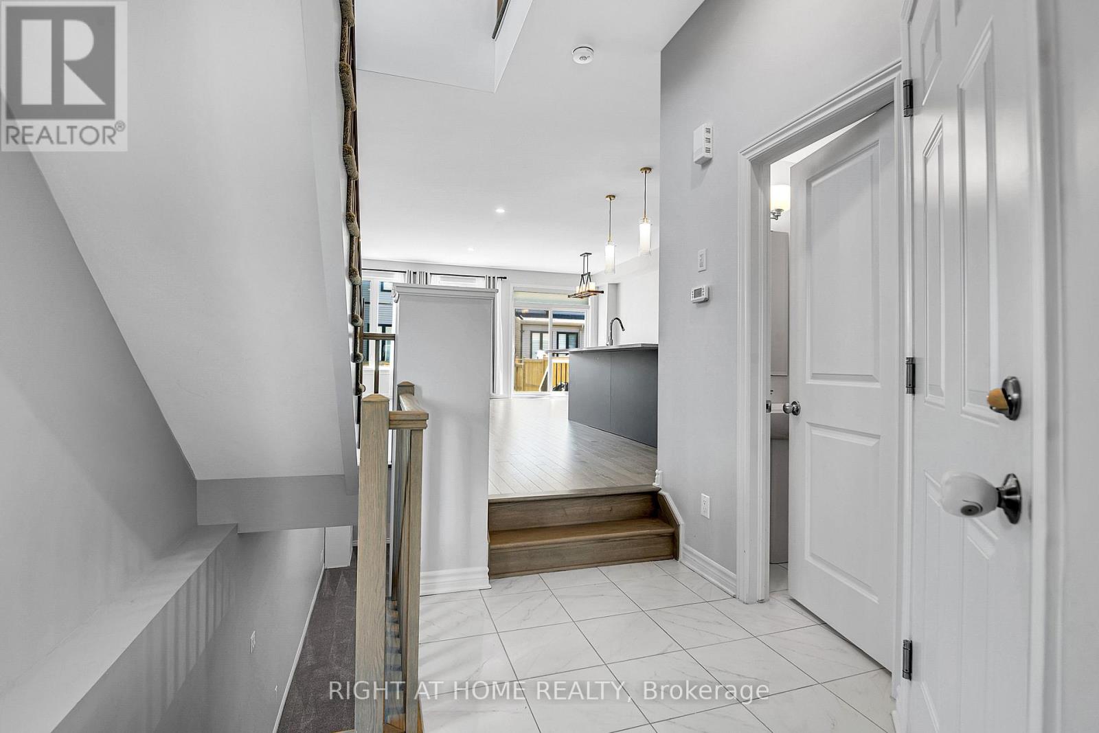 Downstairs to Basement/Partial Bath