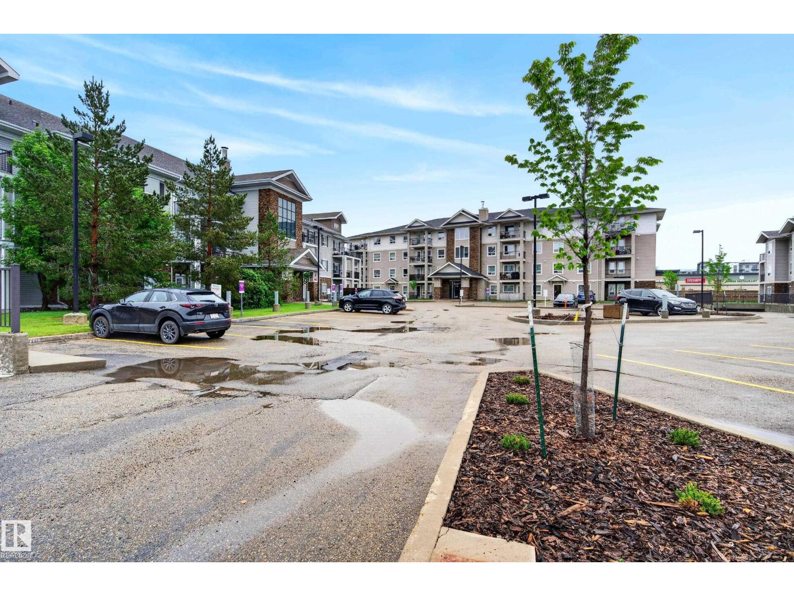 #2402 7343 SOUTH TERWILLEGAR DR NW - 65