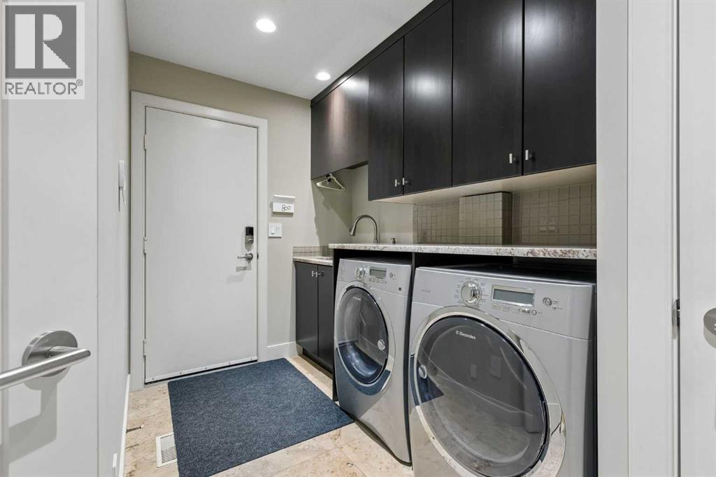 Laundry area with sink