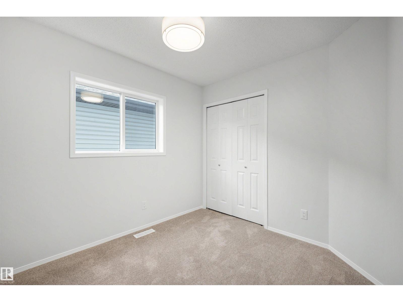 11815 8 AV NW - 10