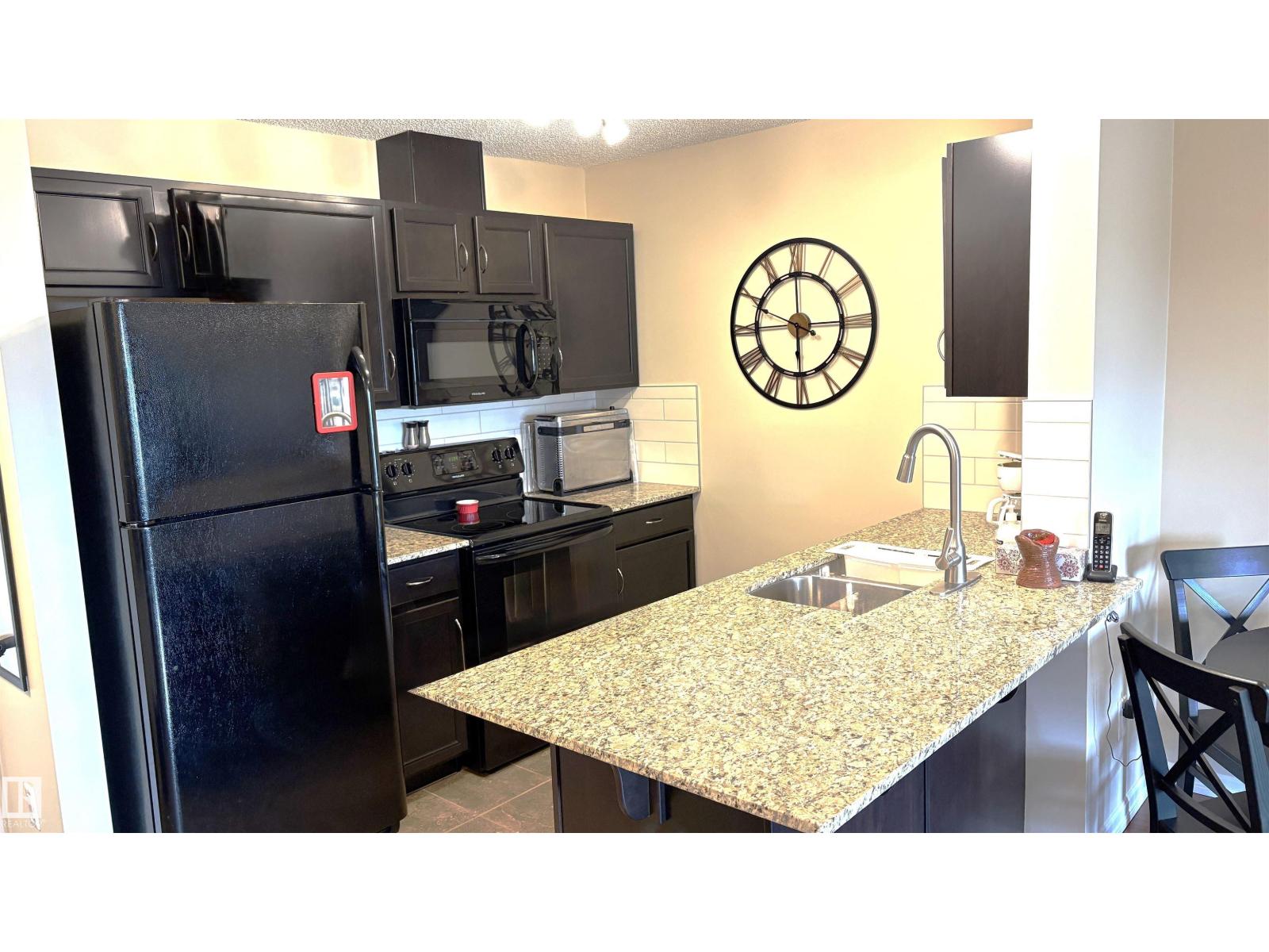 #402 273 CHARLOTTE WY - 9