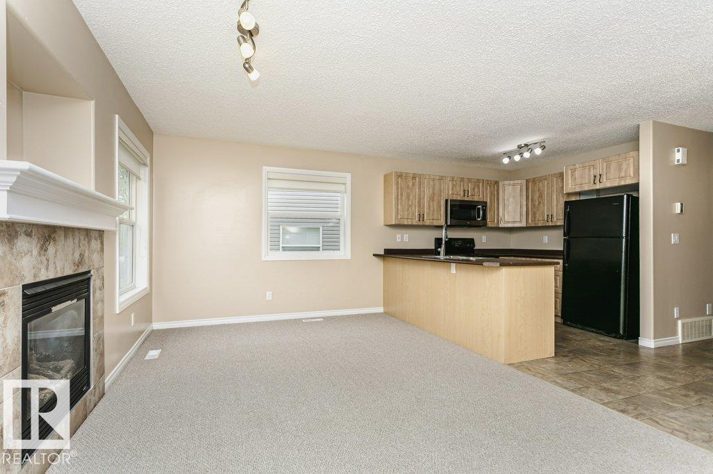 #21 15 WOODSMERE CL - 35