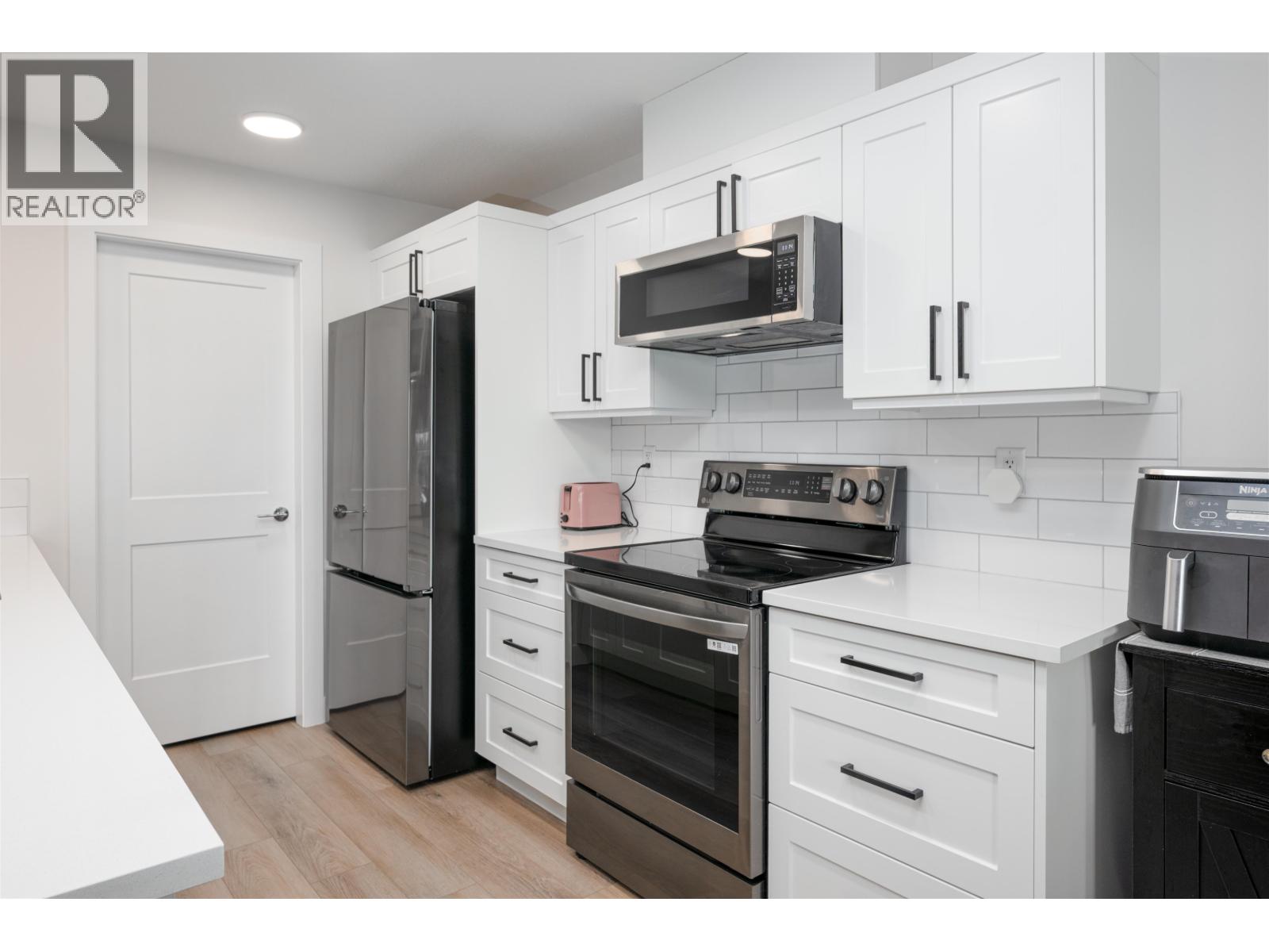 Primary bedroom of 208 4278 22ND AVENUE · Prince George, BC