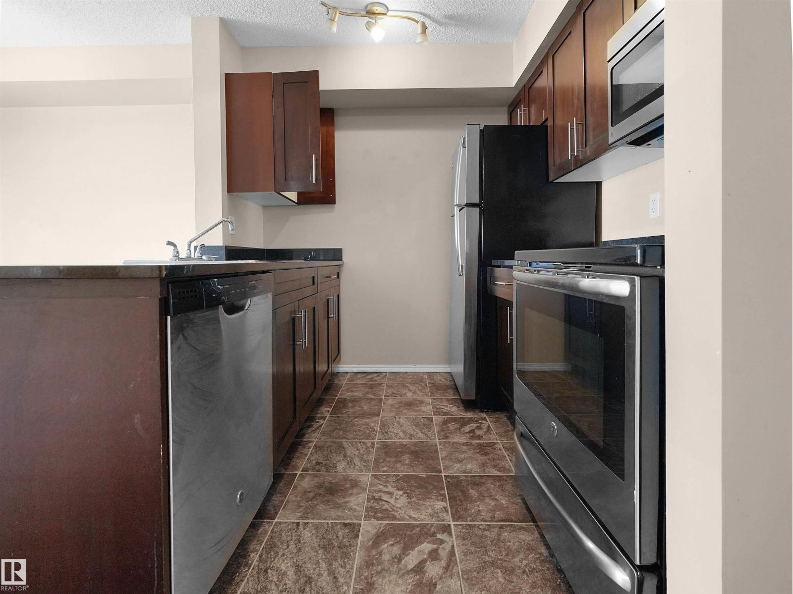 #115 12035 22 AV SW - 9