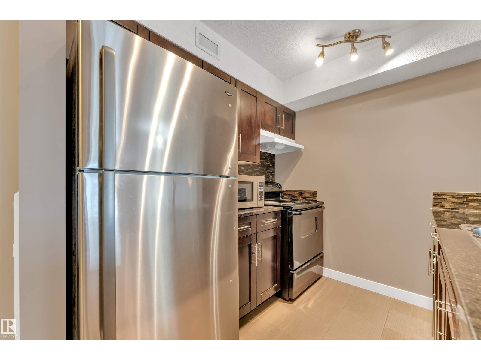 #209 11812 22 AV SW SW - 13