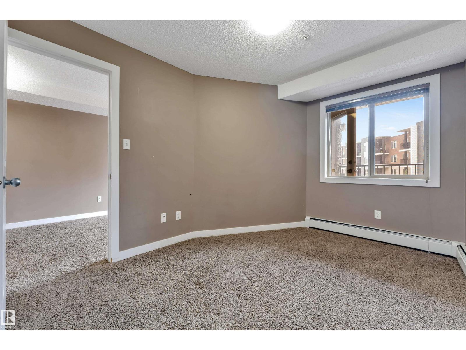 #209 11812 22 AV SW SW - 7