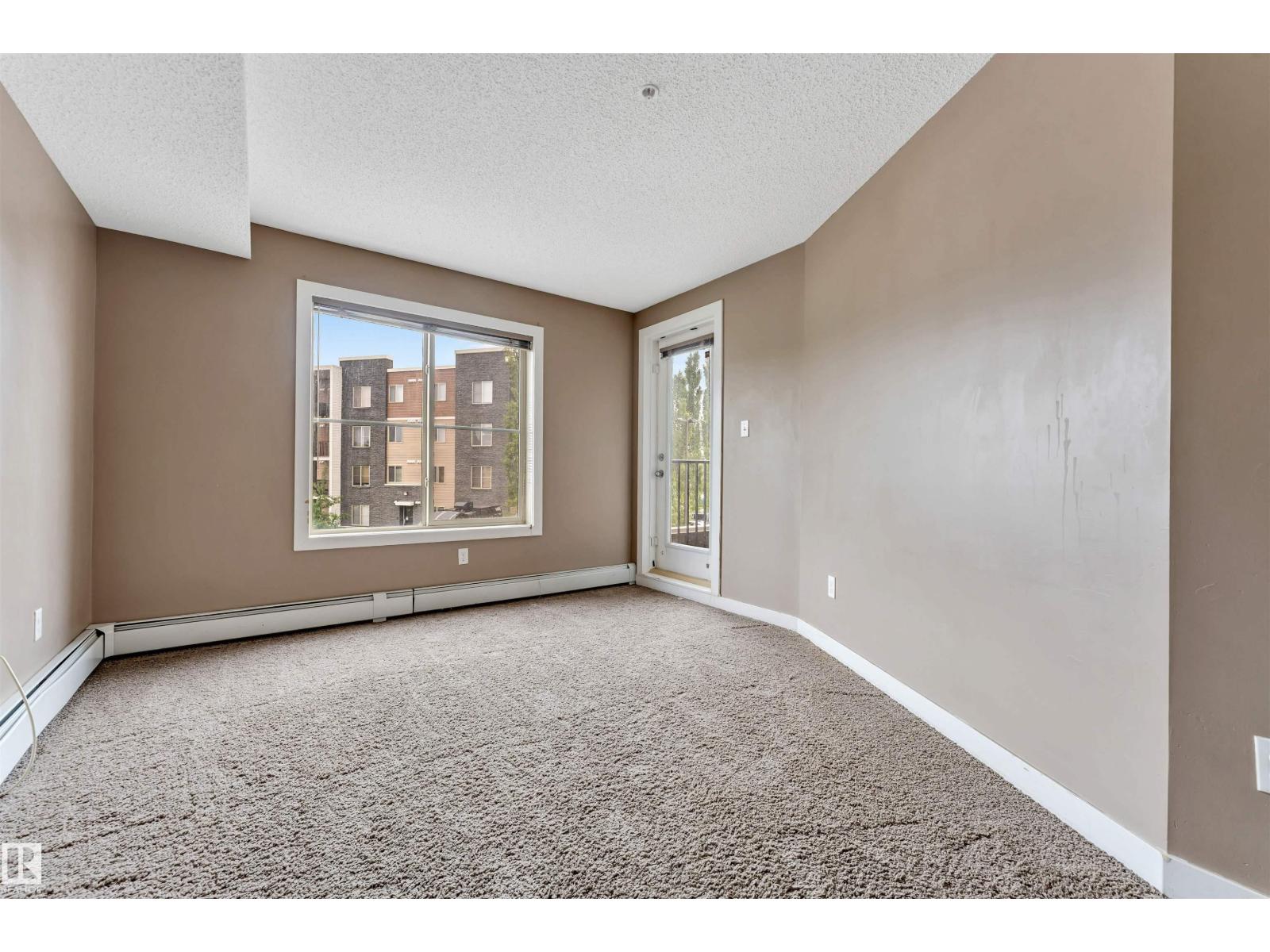 #209 11812 22 AV SW SW - 3