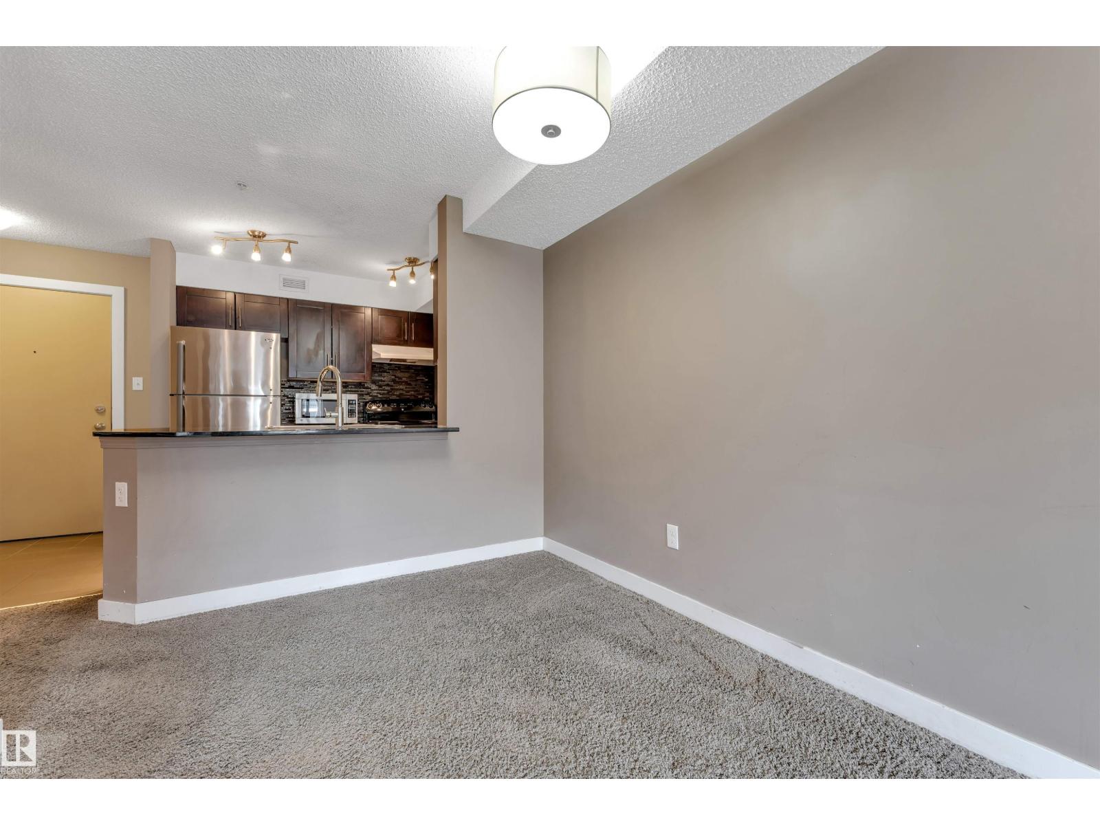 #209 11812 22 AV SW SW - 5