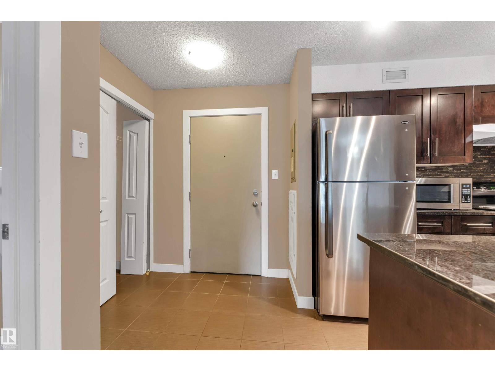 #209 11812 22 AV SW SW - 11