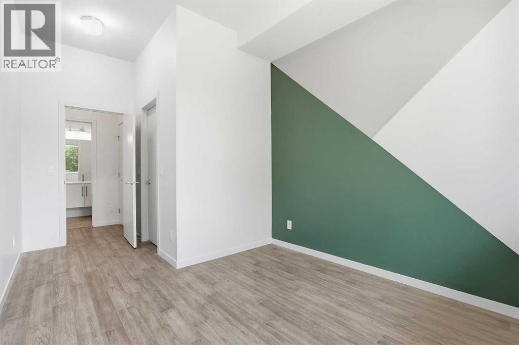 #107 317 22 Avenue SW - 23