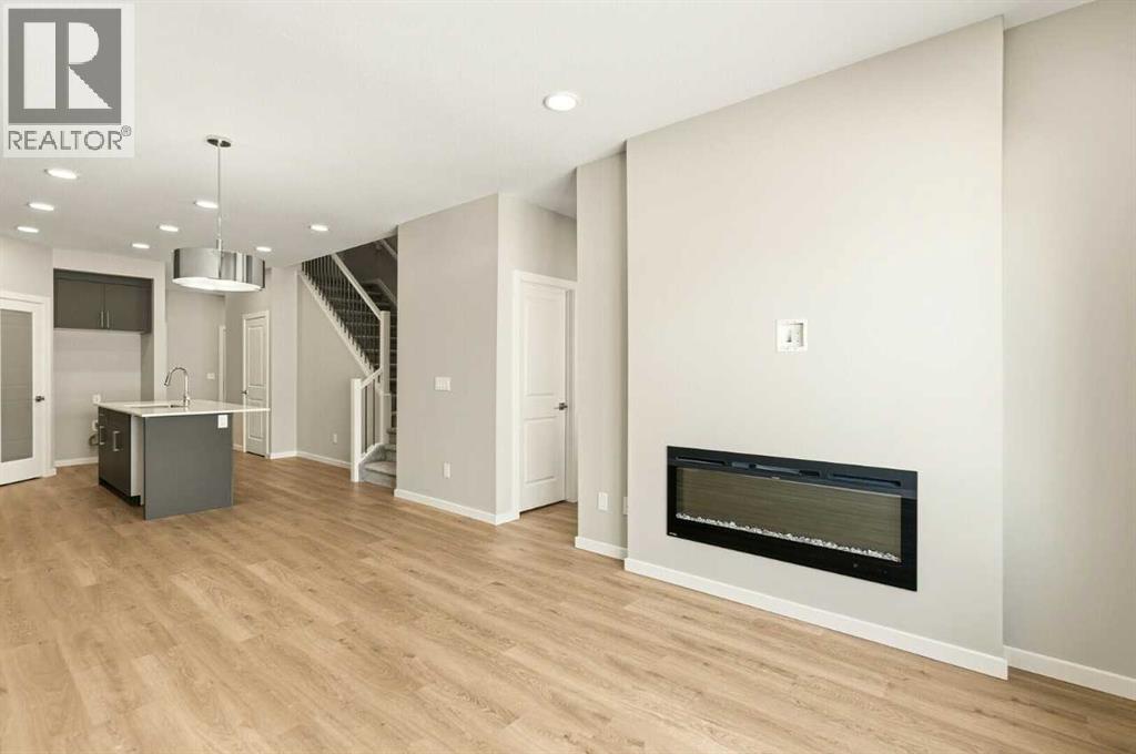 Great Room, Dining Area and Designer Kitchen