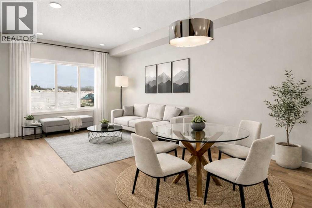 Great Room and Dining area virtually staged for illustration purposes. Furniture and decor not included