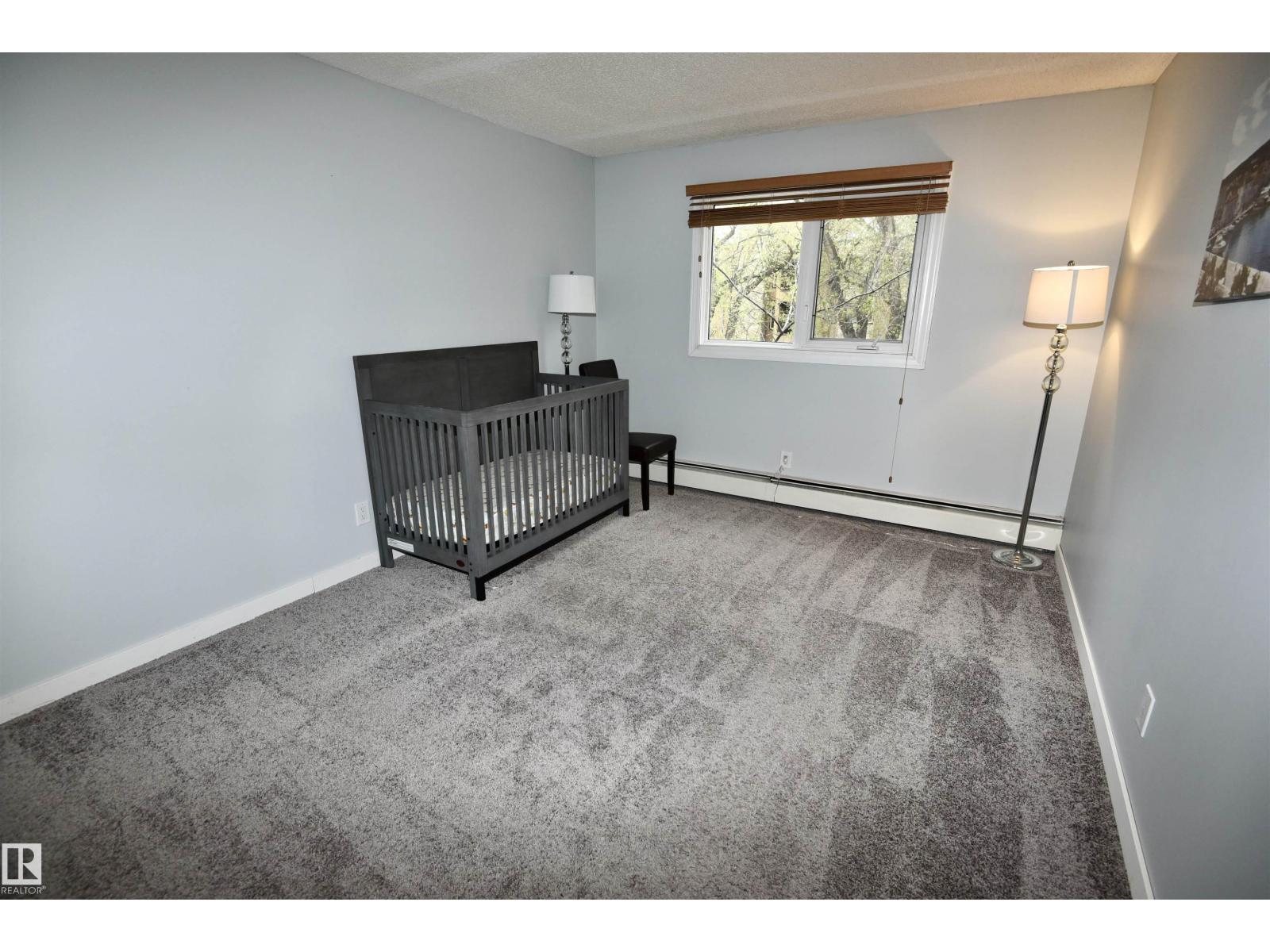 #21 10160 119 ST NW - 11