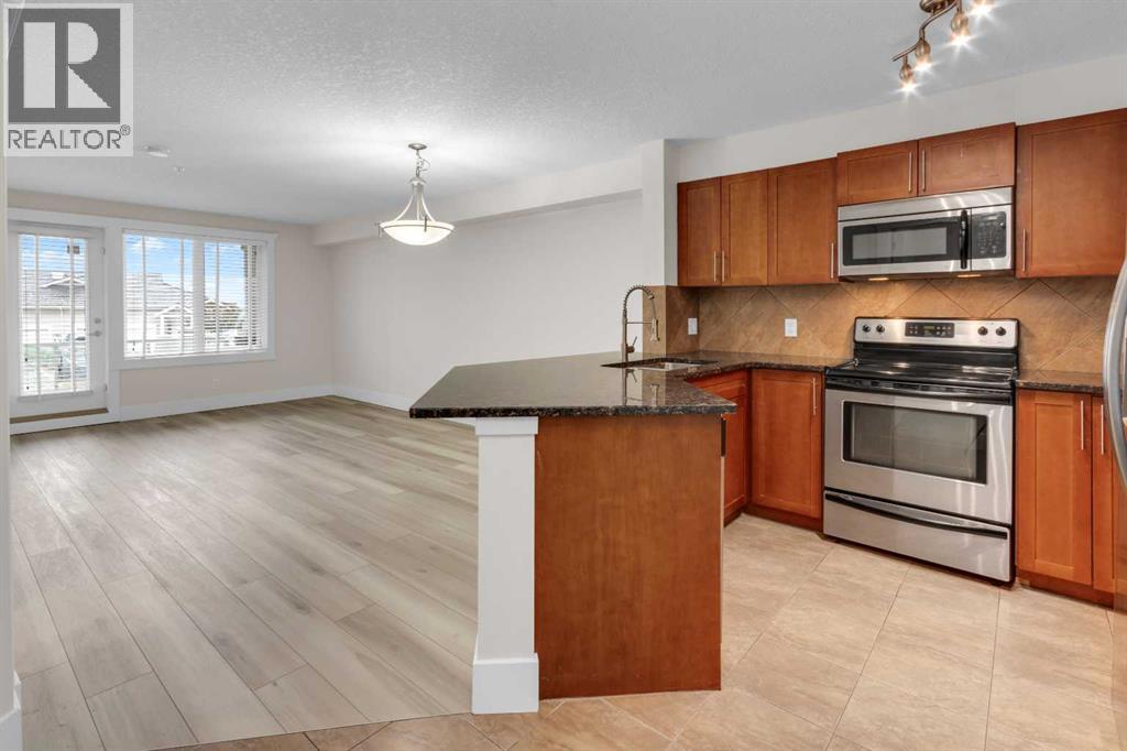 #102 500 Rocky Vista Gardens NW - Image 3