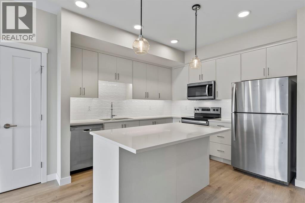 #410 660 Shawnee Square SW - 6