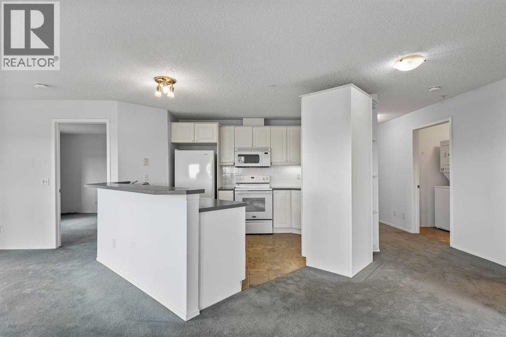 #2111 928 Arbour Lake Road NW - 4