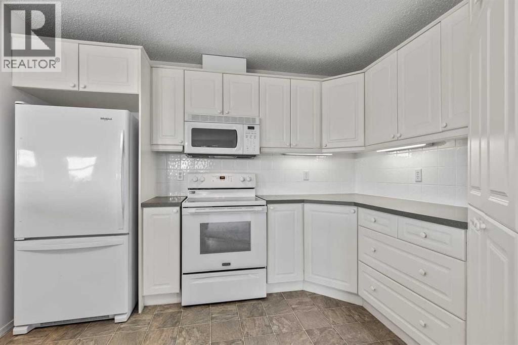 #2111 928 Arbour Lake Road NW - 7