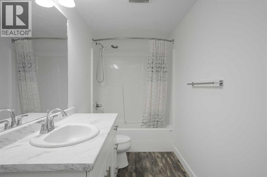 412, 115 Denholm Gate — photo 30