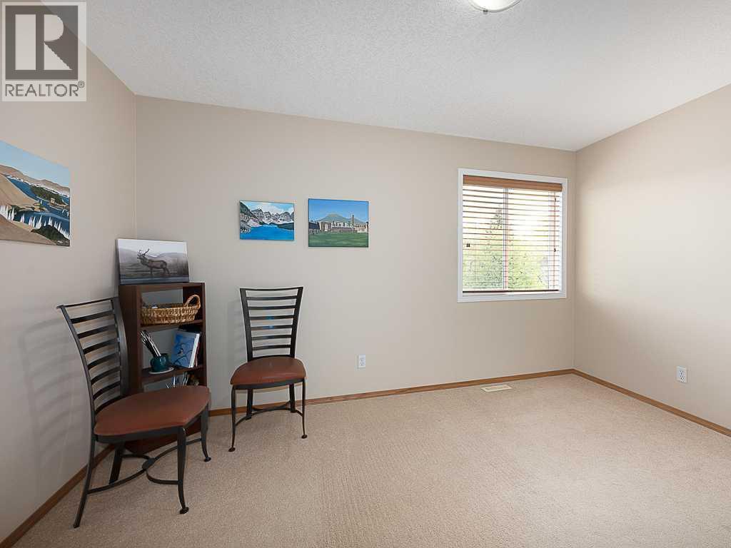143 Cougarstone Square SW — photo 26