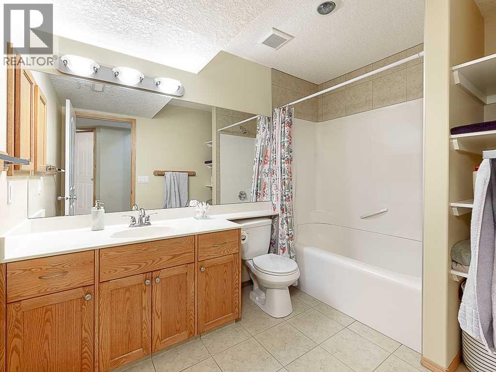 143 Cougarstone Square SW — photo 29