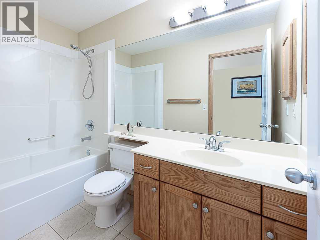143 Cougarstone Square SW — photo 27