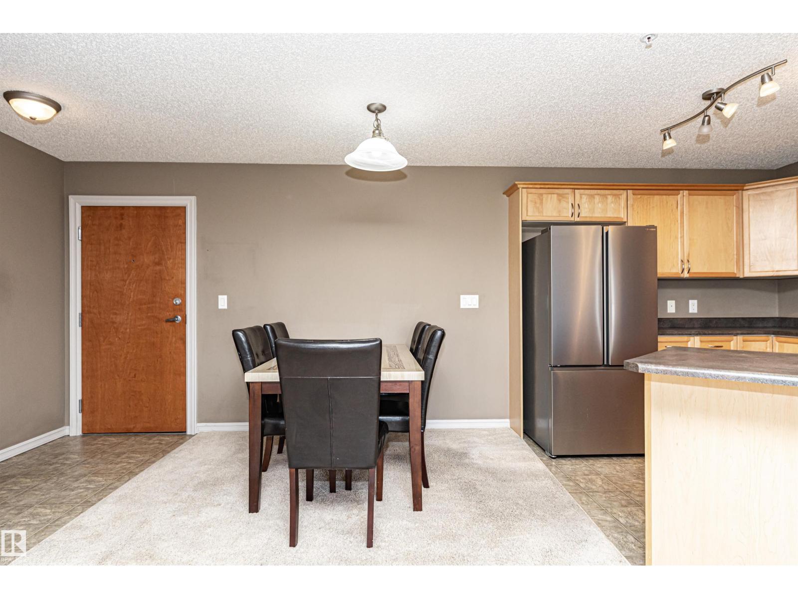 #318 13830 150 AV NW — photo 18