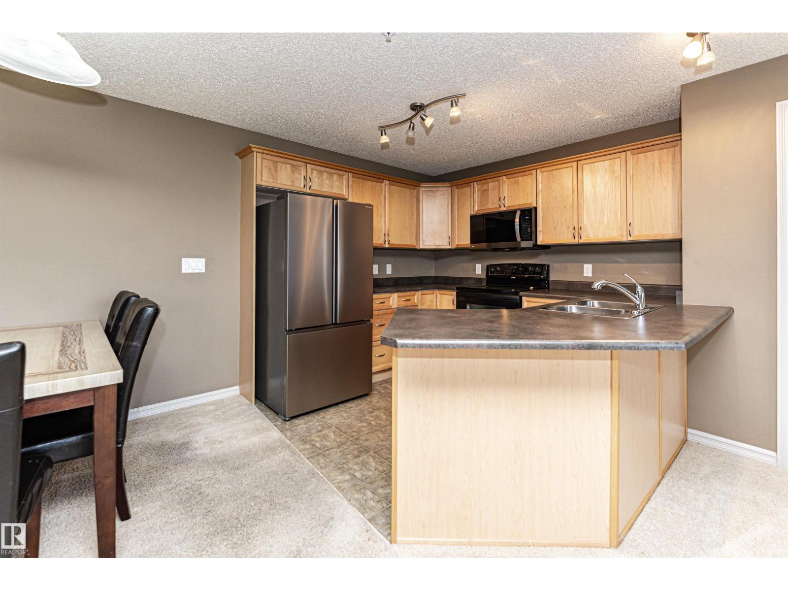 #318 13830 150 AV NW — photo 20