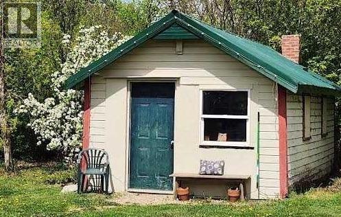 Guest Cabin with infloor heat,, hot water tank, sink . with Toilet to be installed