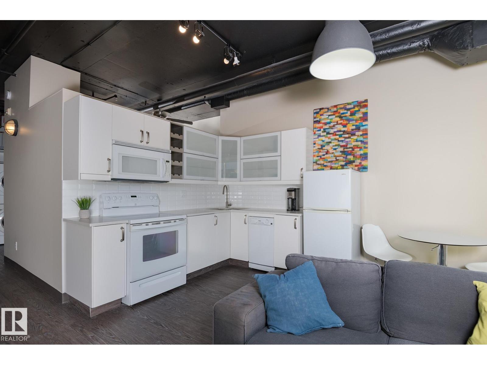 #411 10024 JASPER AV NW — photo 9