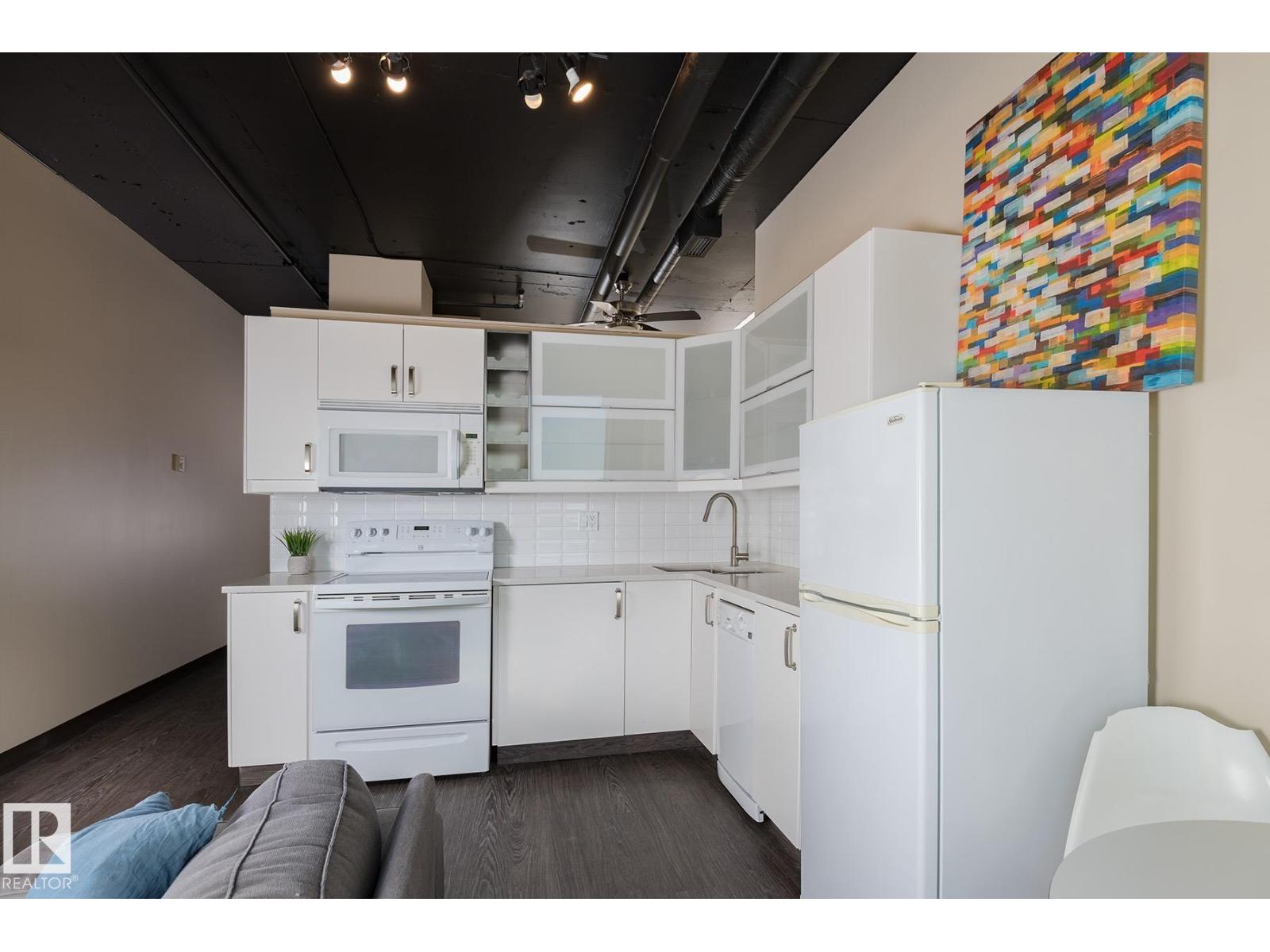 #411 10024 JASPER AV NW — photo 13