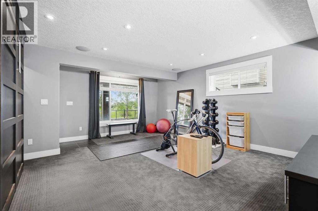 114 Cougarstone Crescent SW — photo 32