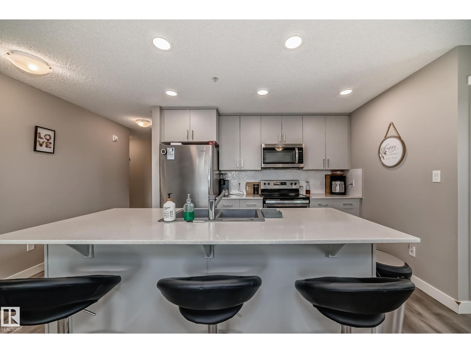 #103 1506 TAMARACK BV NW - 2