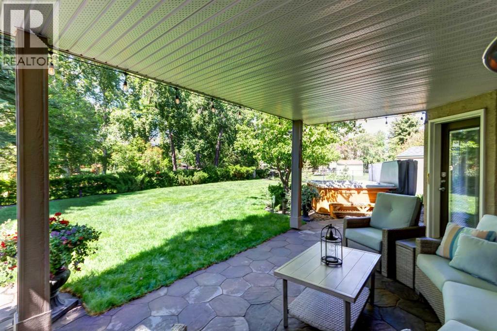 Beautiful Covered Stone Patio Off of Walkout