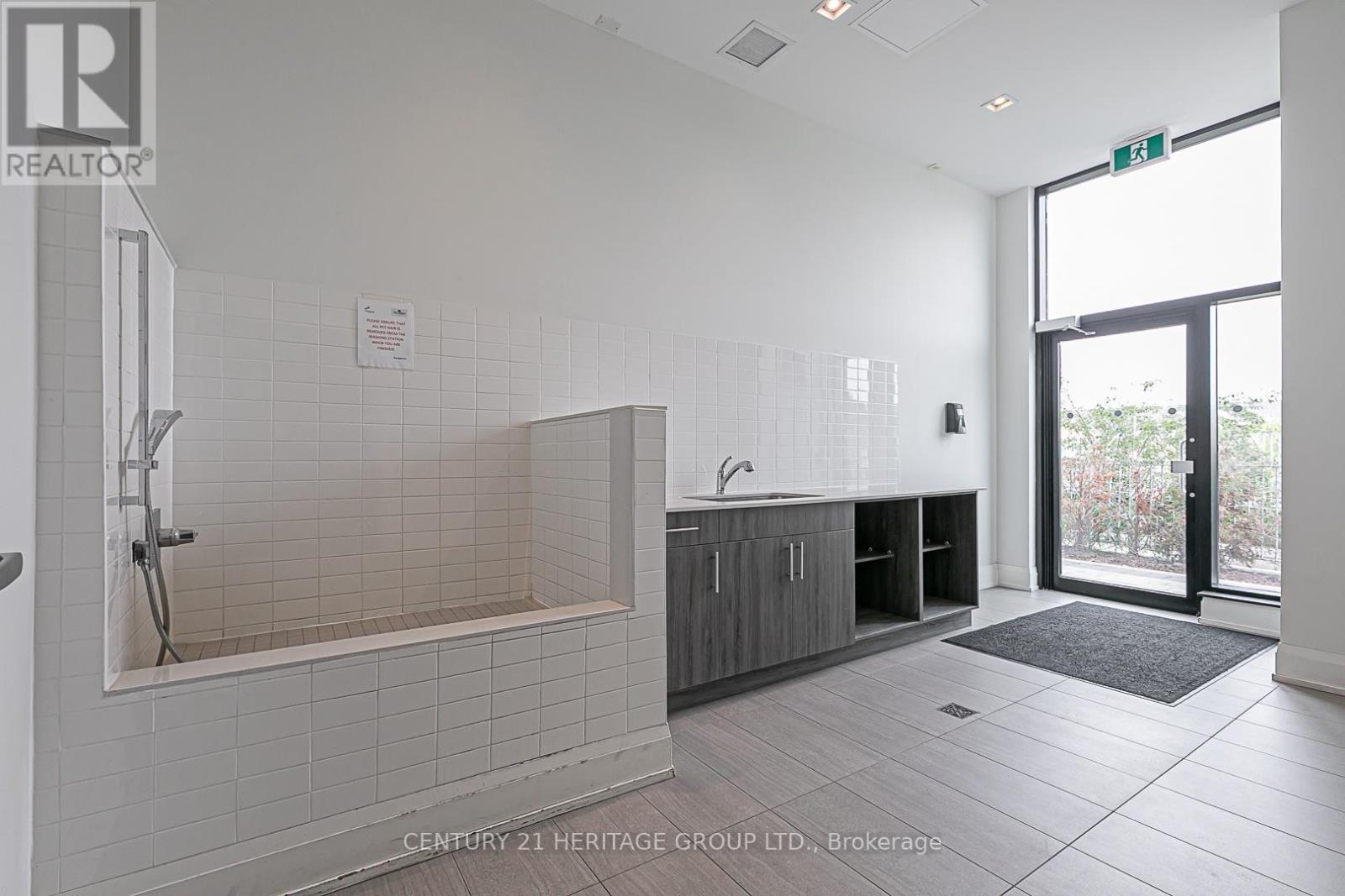 #208 555 WILLIAM GRAHAM DRIVE - 32