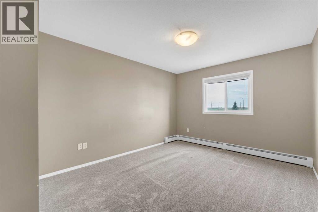 215, 1648 Saamis Drive NW — photo 18