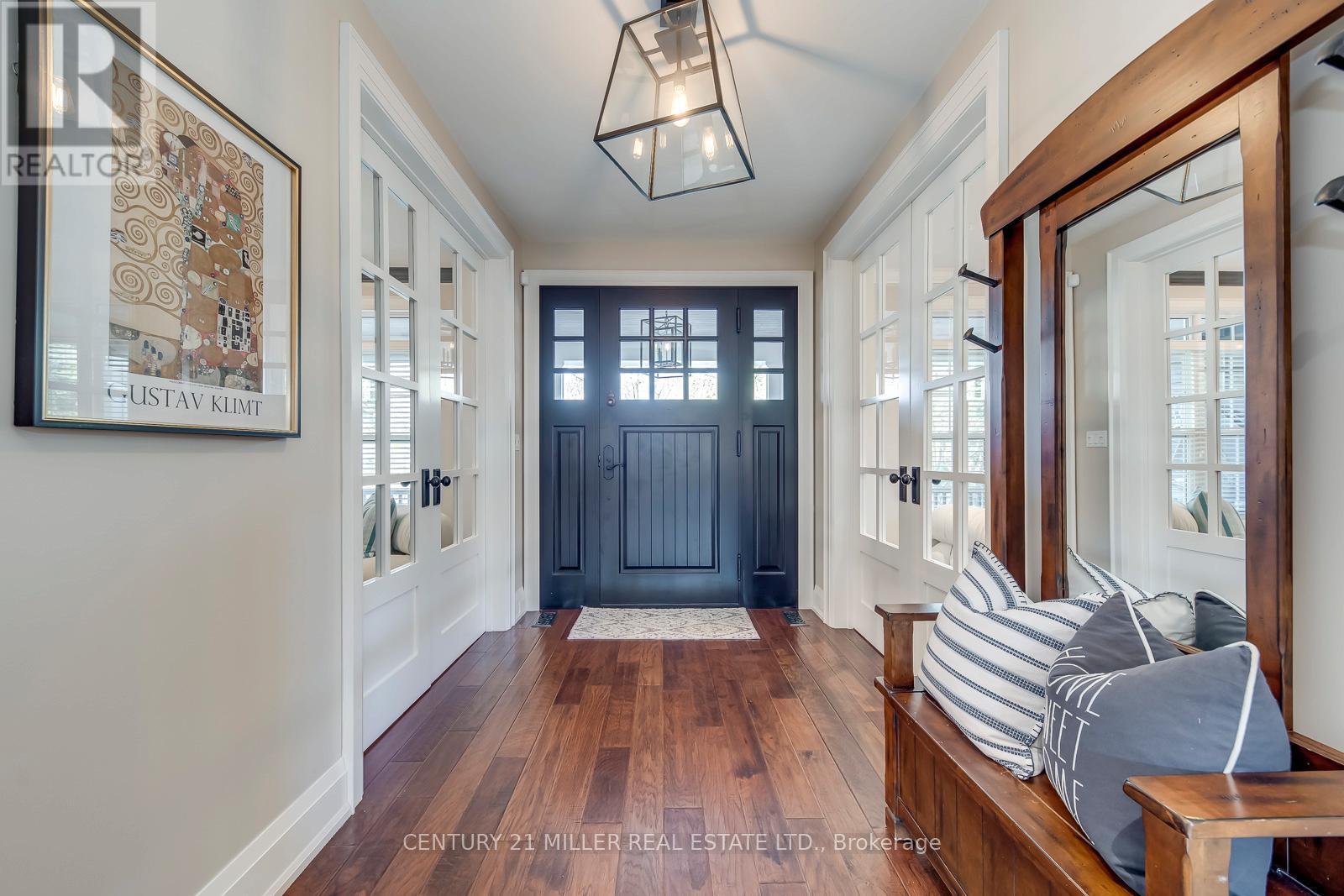 Elegant Front Foyer With Built-Ins