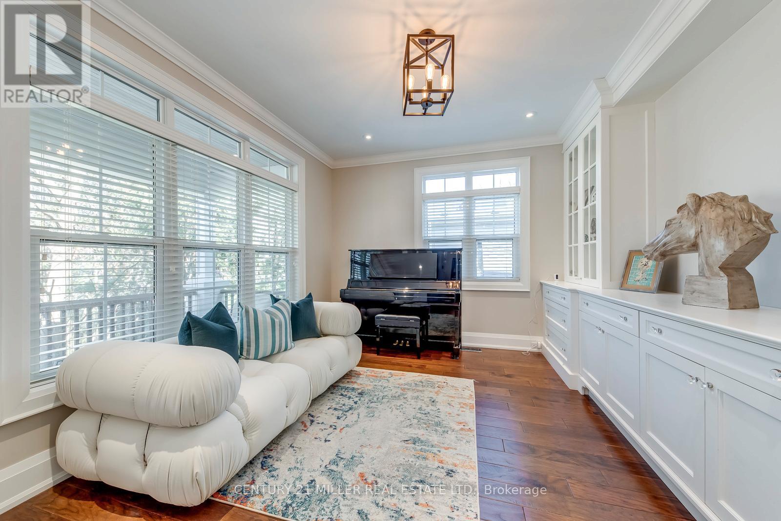Sun-Filled Sitting Room With Built-Ins