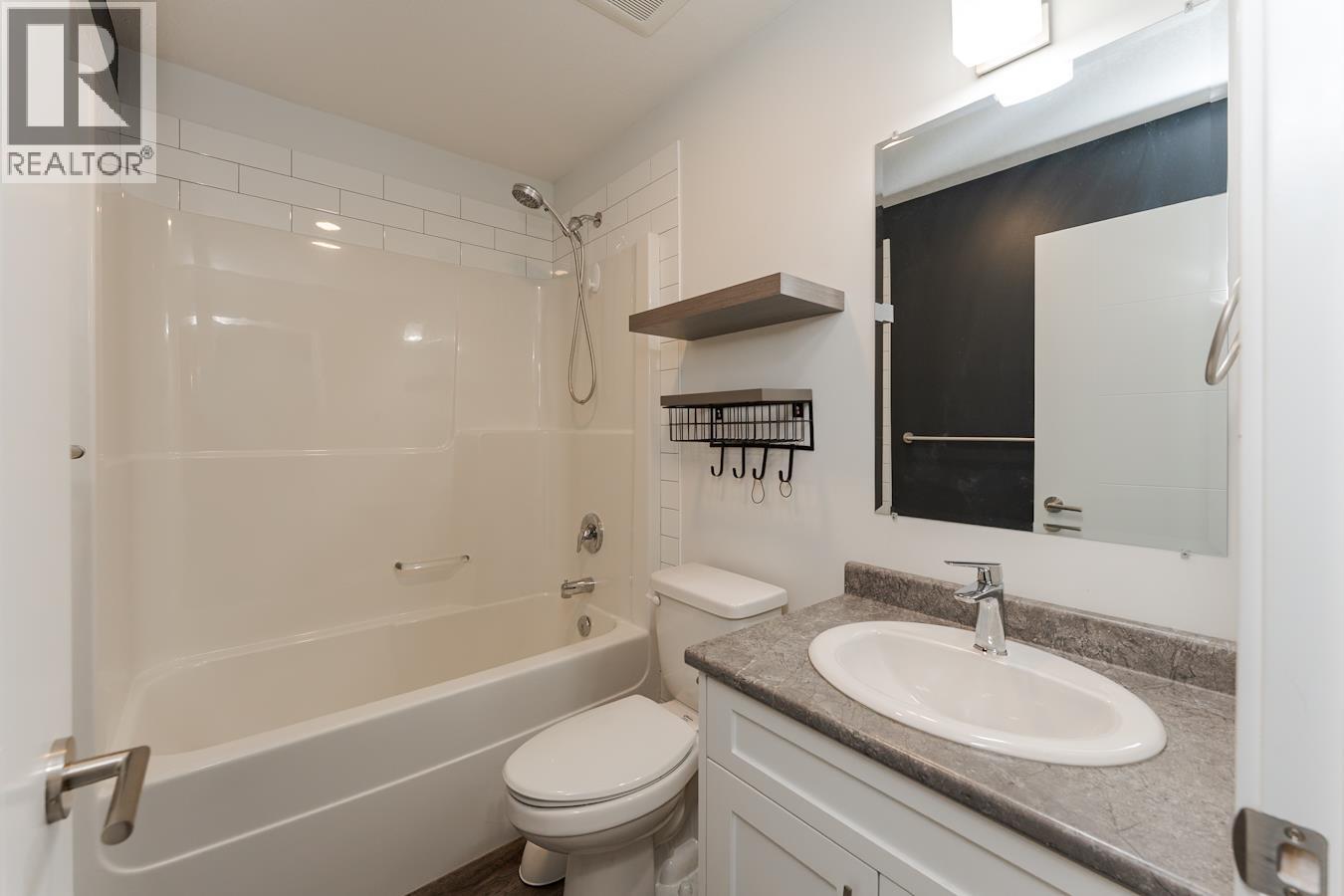 Photo 12 of 39 — 7034 HILLU ROAD · Prince George, BC